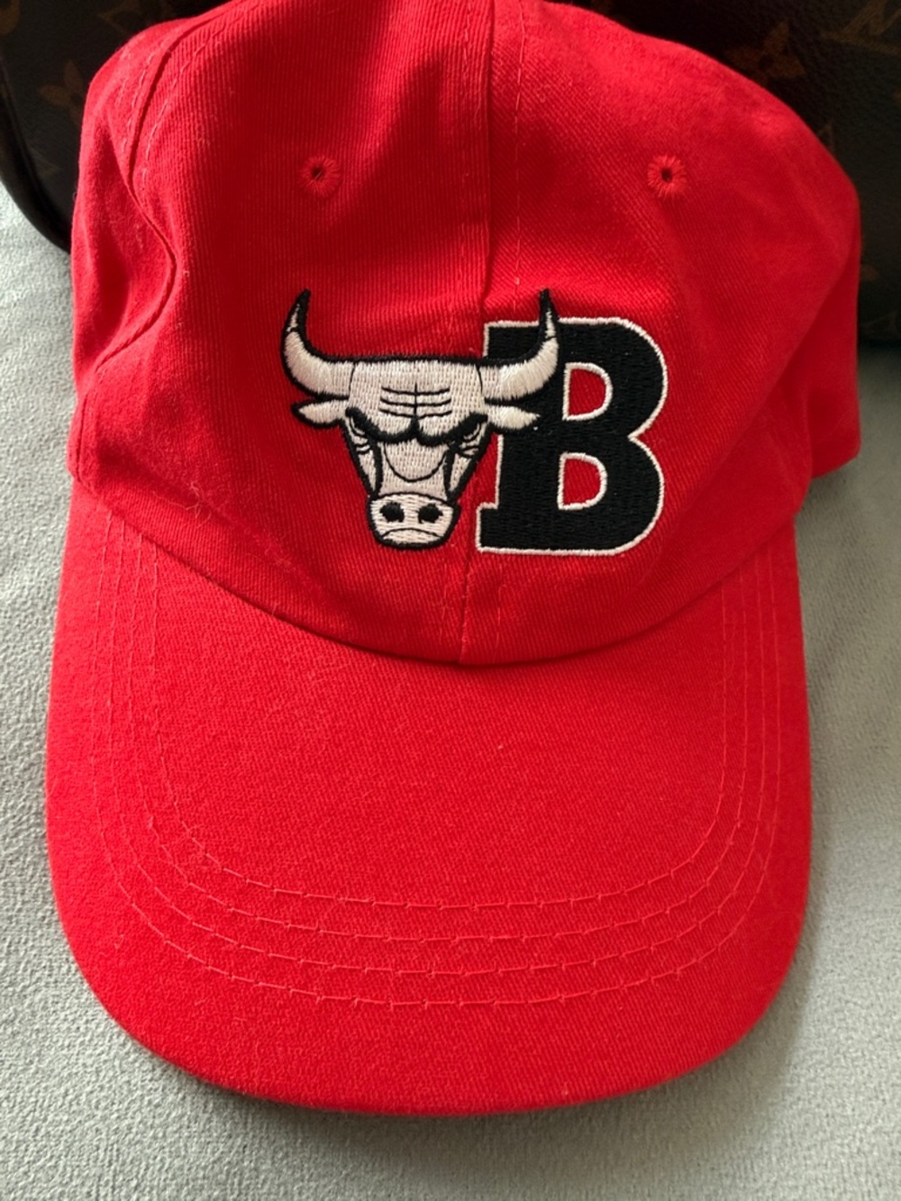 Red Baseball Cap with Embroidered Bull and 'B' Logo